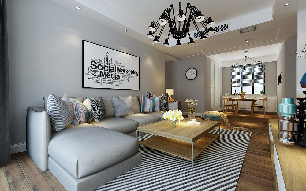 客厅沙发背景：沙发墙采用了简约风格常用的手法，轻装修重装饰，挂画来点缀。
